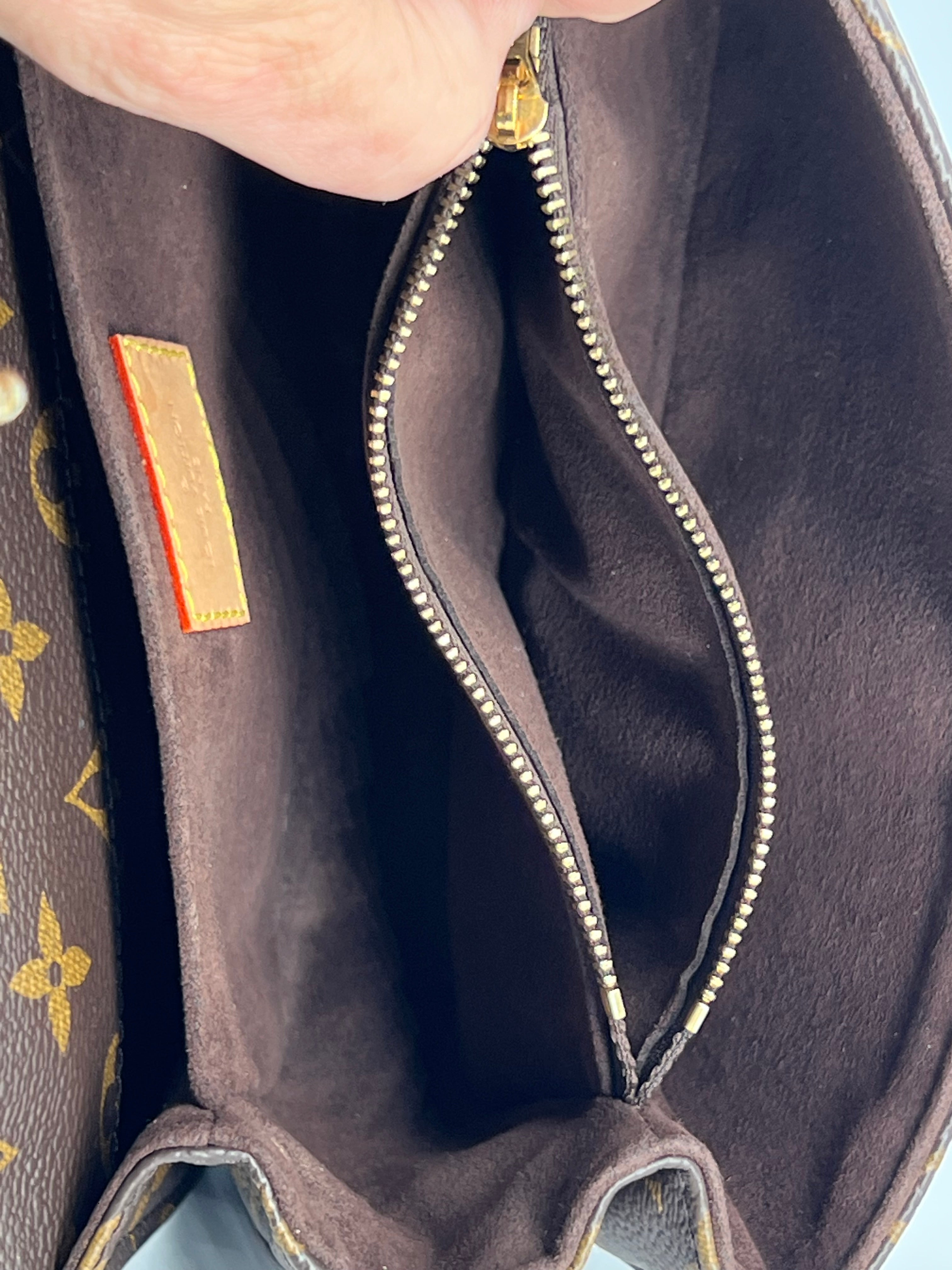 Louis Vuitton Pochette Métis East West Monogram Canvas Bag