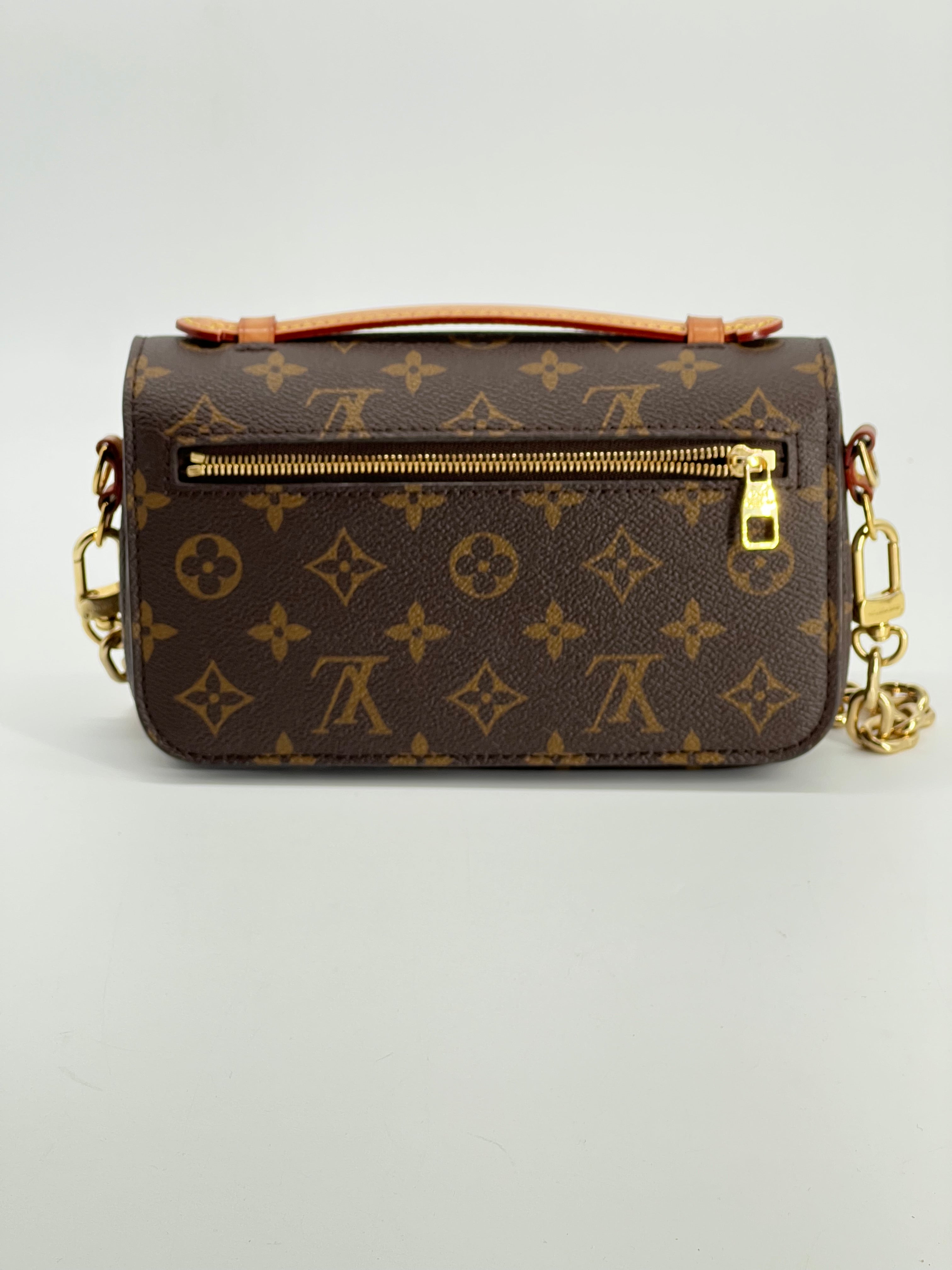 Louis Vuitton Pochette Métis East West Monogram Canvas Bag