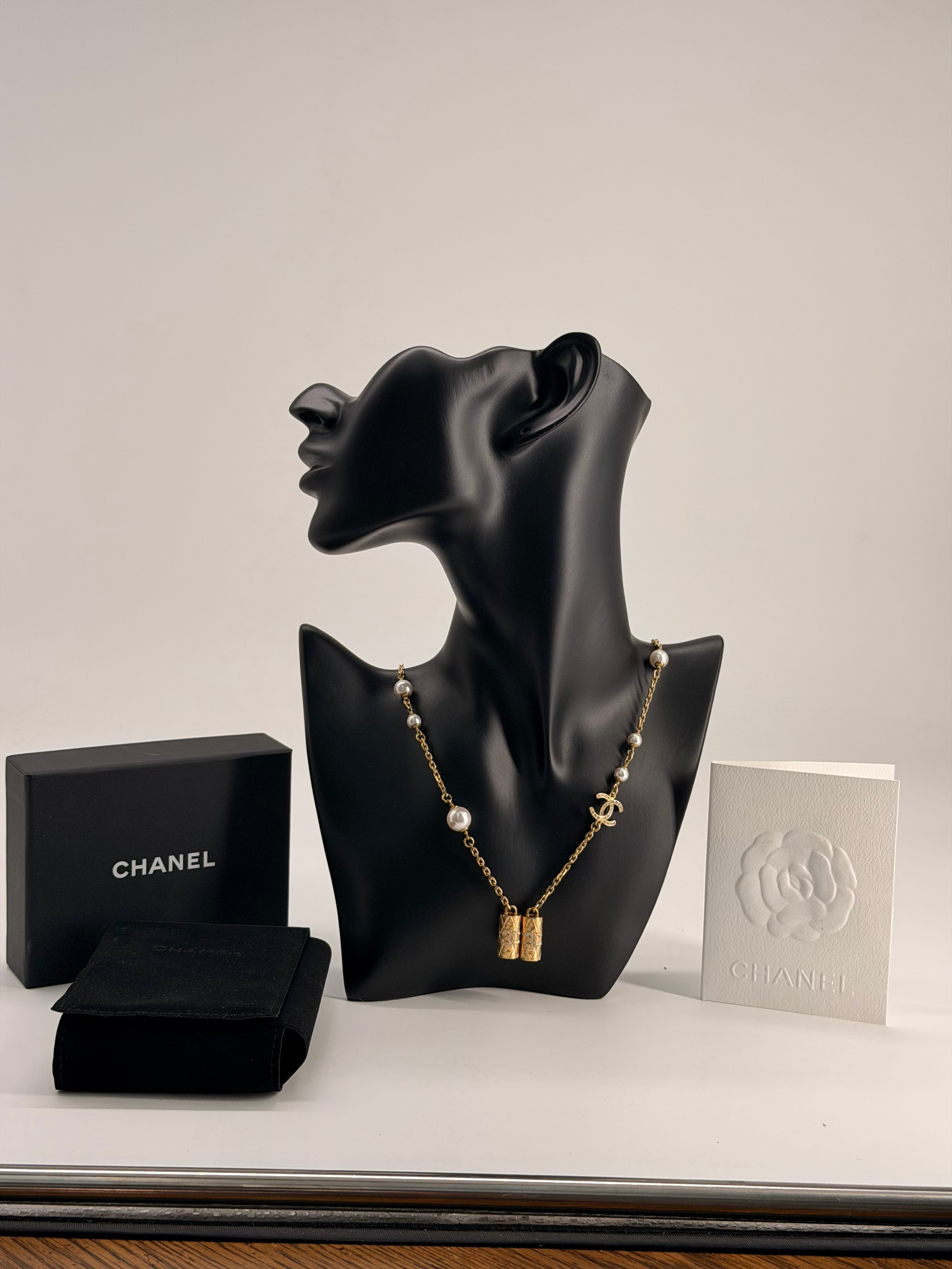 CHANEL Metal Crystal Pearl Airpod Necklace Gold