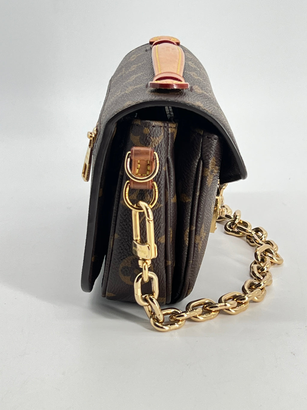 Louis Vuitton Pochette Métis East West Monogram Canvas Bag