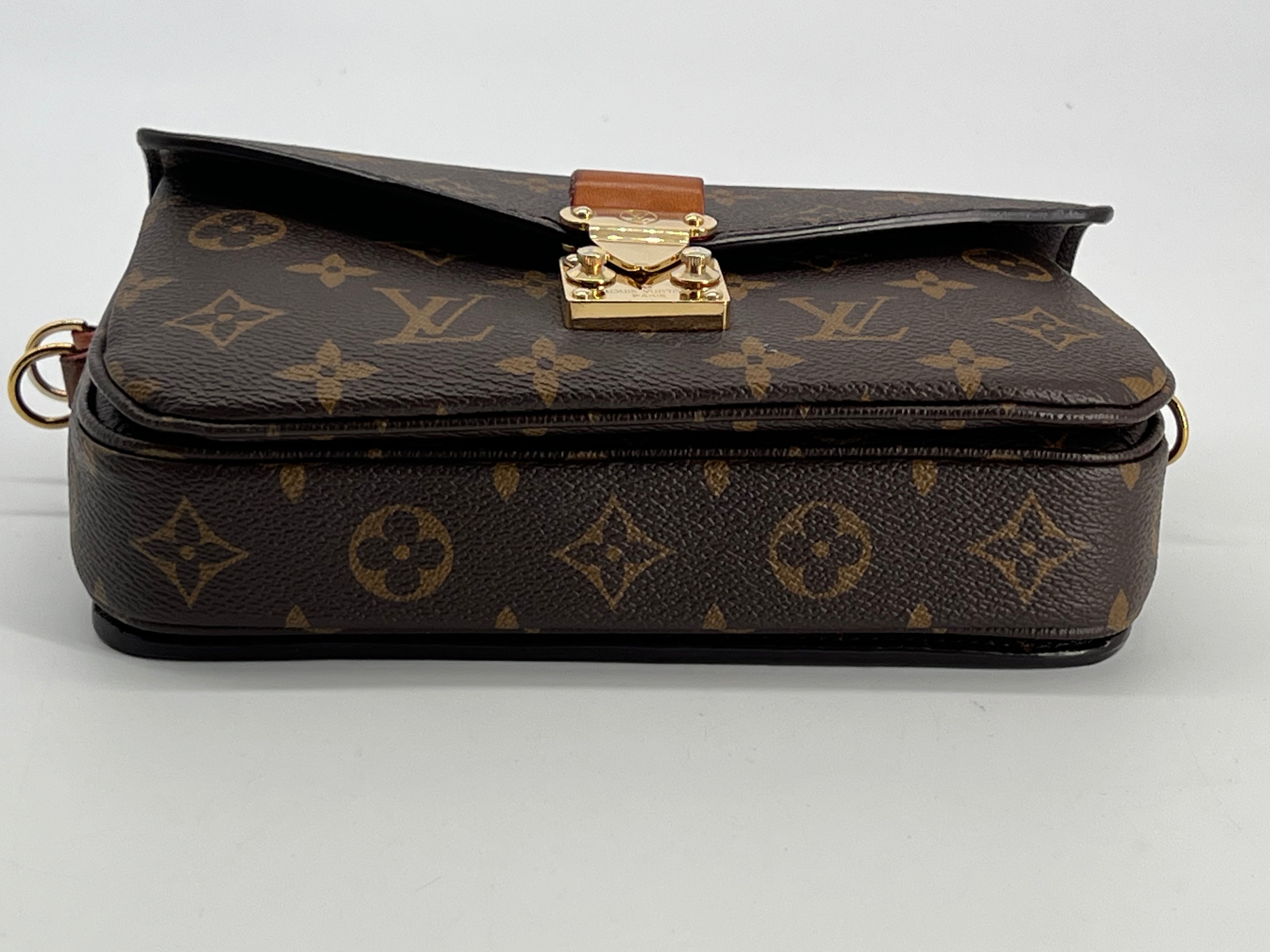 Louis Vuitton Pochette Métis East West Monogram Canvas Bag