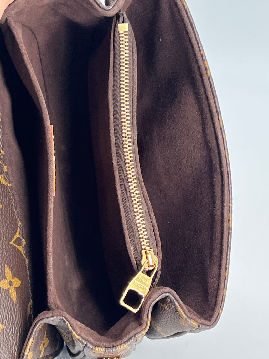 Louis Vuitton Pochette Métis East West Monogram Canvas Bag