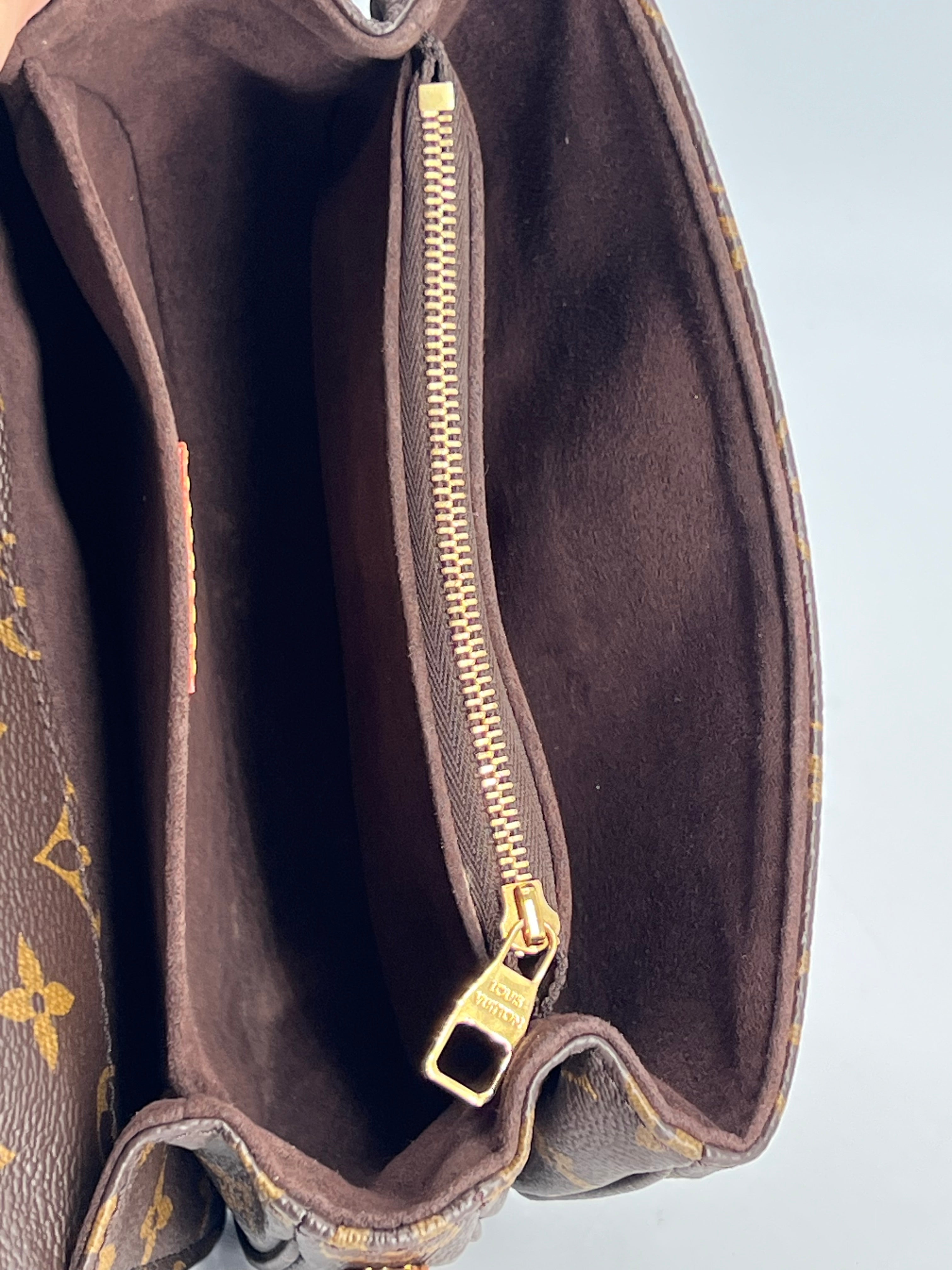 Louis Vuitton Pochette Métis East West Monogram Canvas Bag