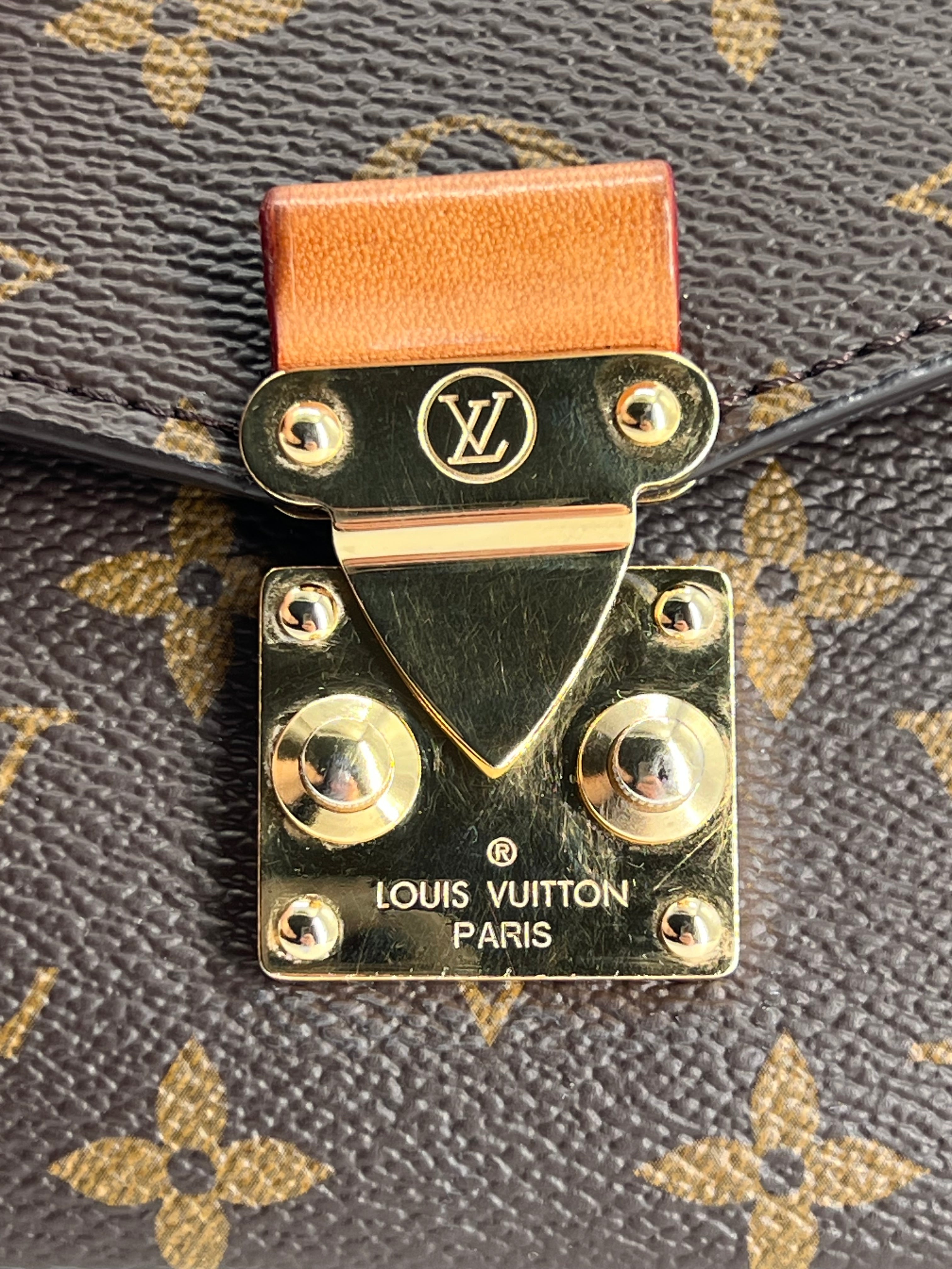 Louis Vuitton Pochette Métis East West Monogram Canvas Bag