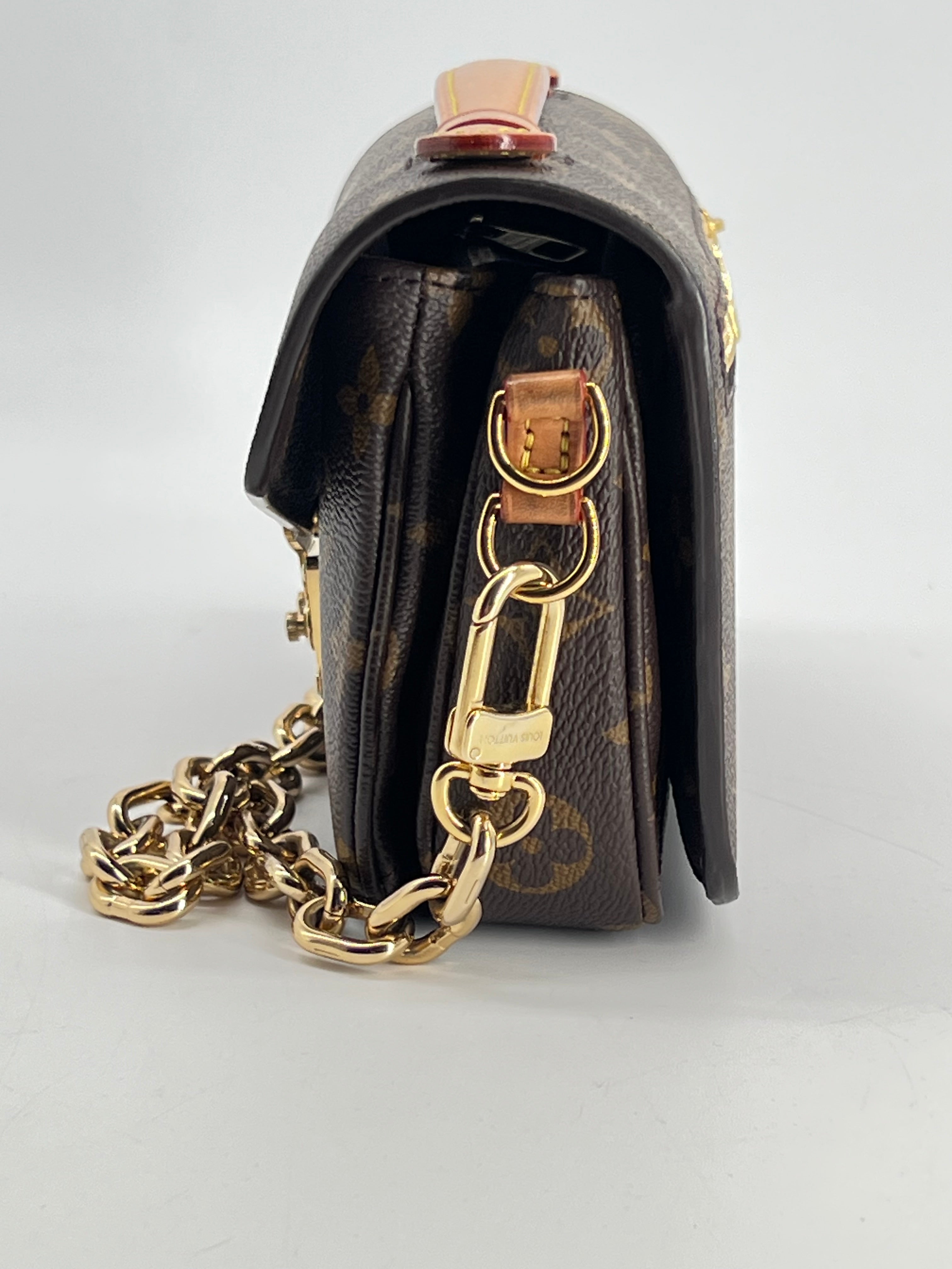 Louis Vuitton Pochette Métis East West Monogram Canvas Bag