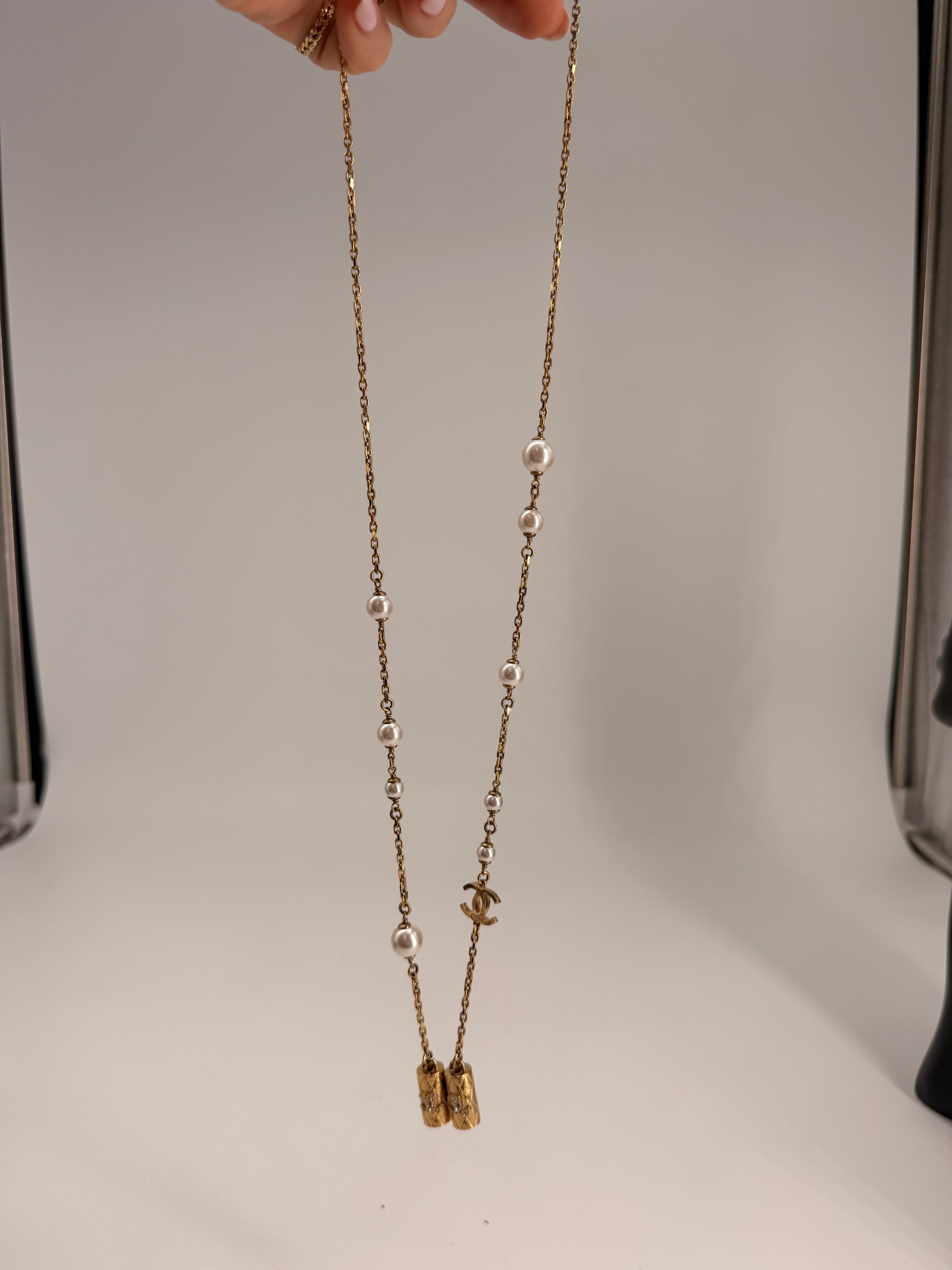 CHANEL Metal Crystal Pearl Airpod Necklace Gold