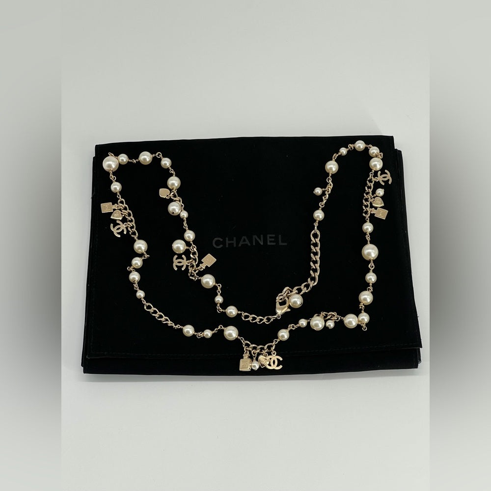 Chanel Pearl Necklace And Light Gold Metal Charms Necklace 2018