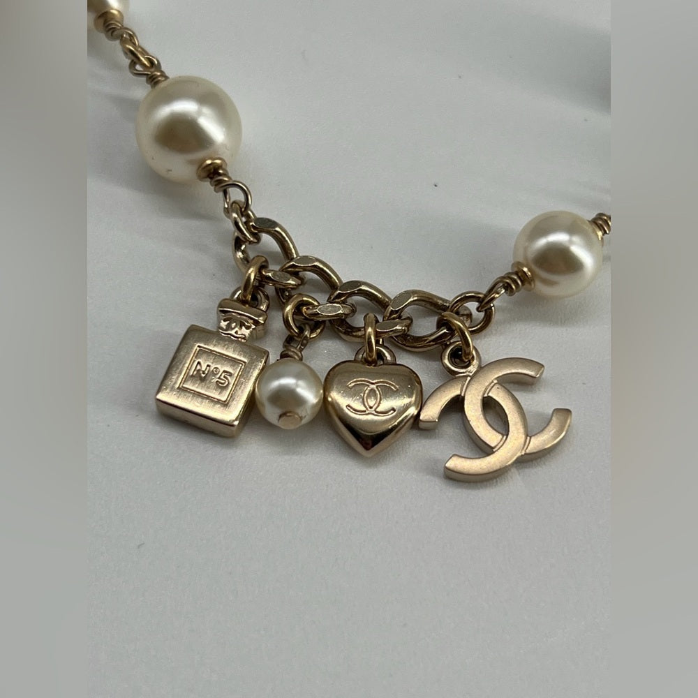 Chanel Pearl Necklace And Light Gold Metal Charms Necklace 2018