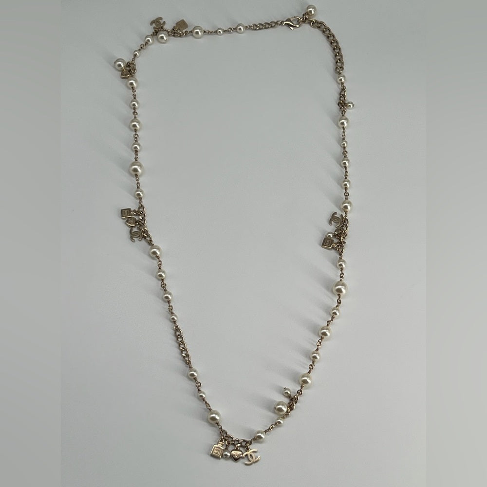 Chanel Pearl Necklace And Light Gold Metal Charms Necklace 2018