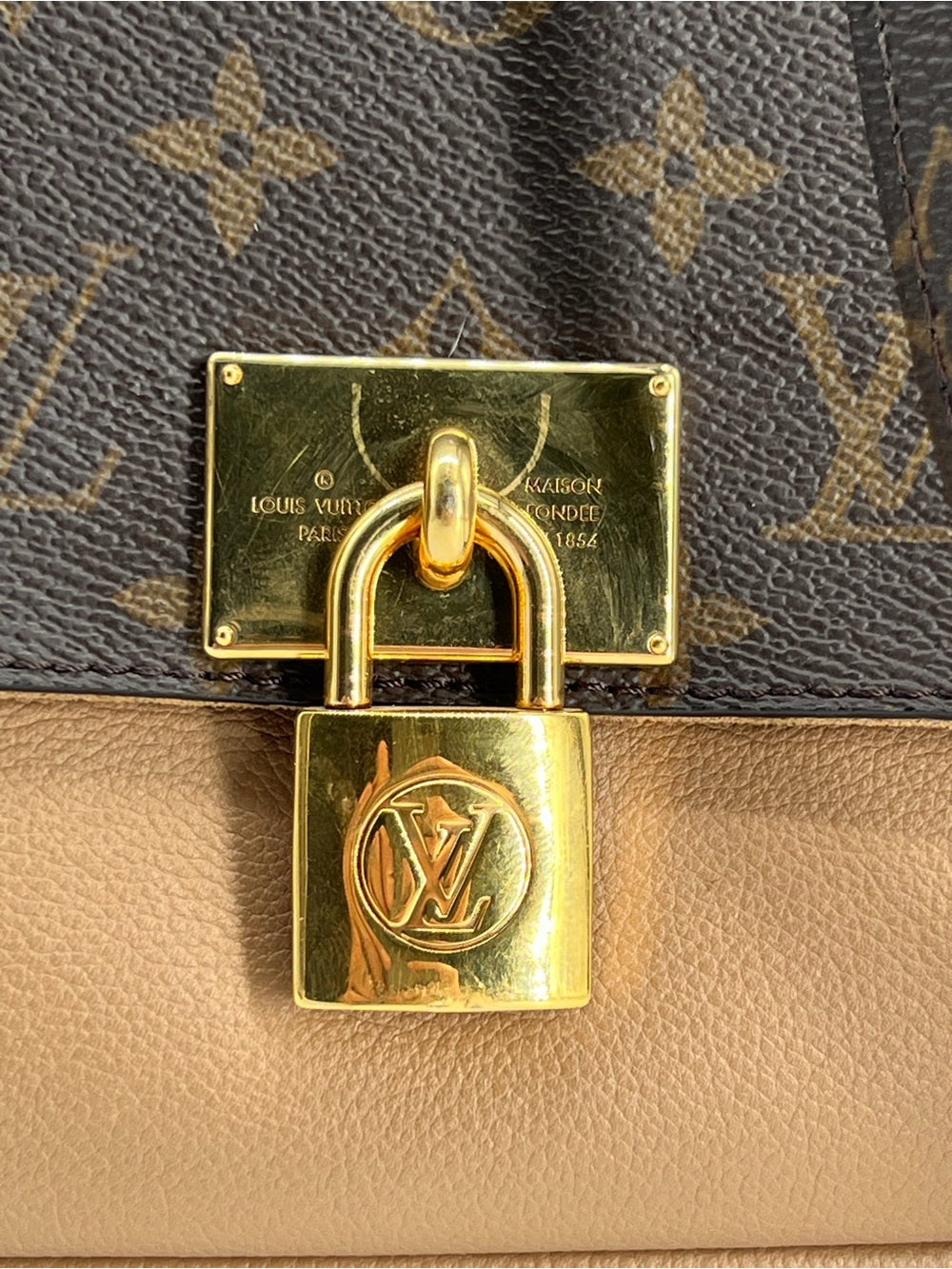 Louis Vuitton Marignan Monogram Leather Handbag