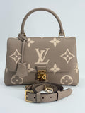Louis Vuitton Madeleine Handbag Monogram Empreinte Giant MM Top Handle Bag — view 1